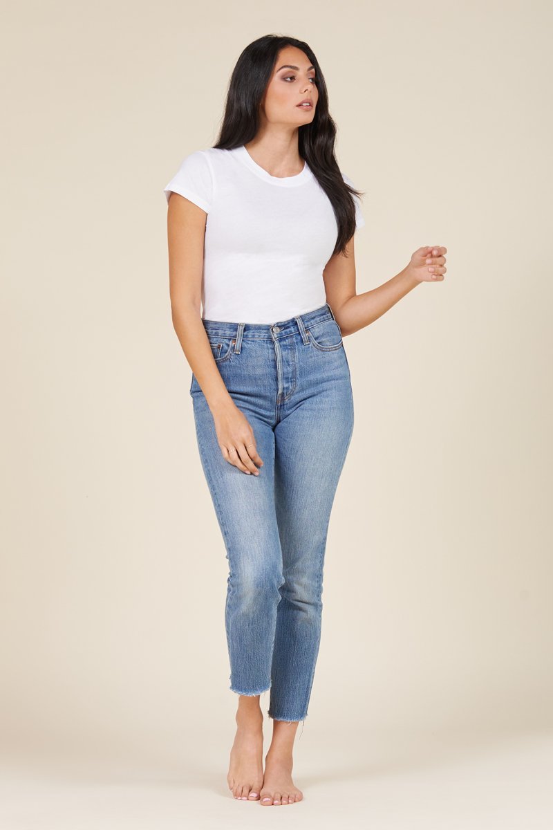 full body view of essential white tee