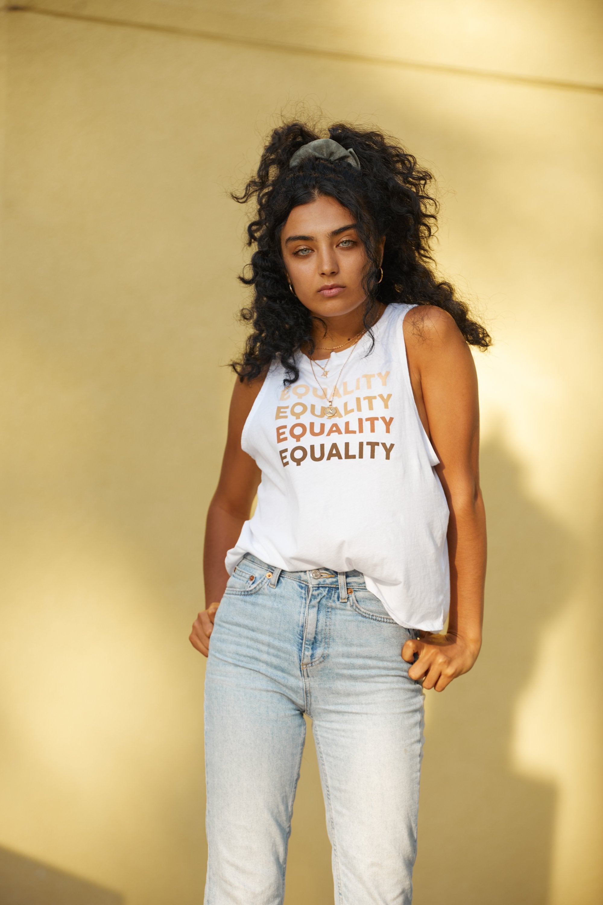white tank top with tan equality messaging