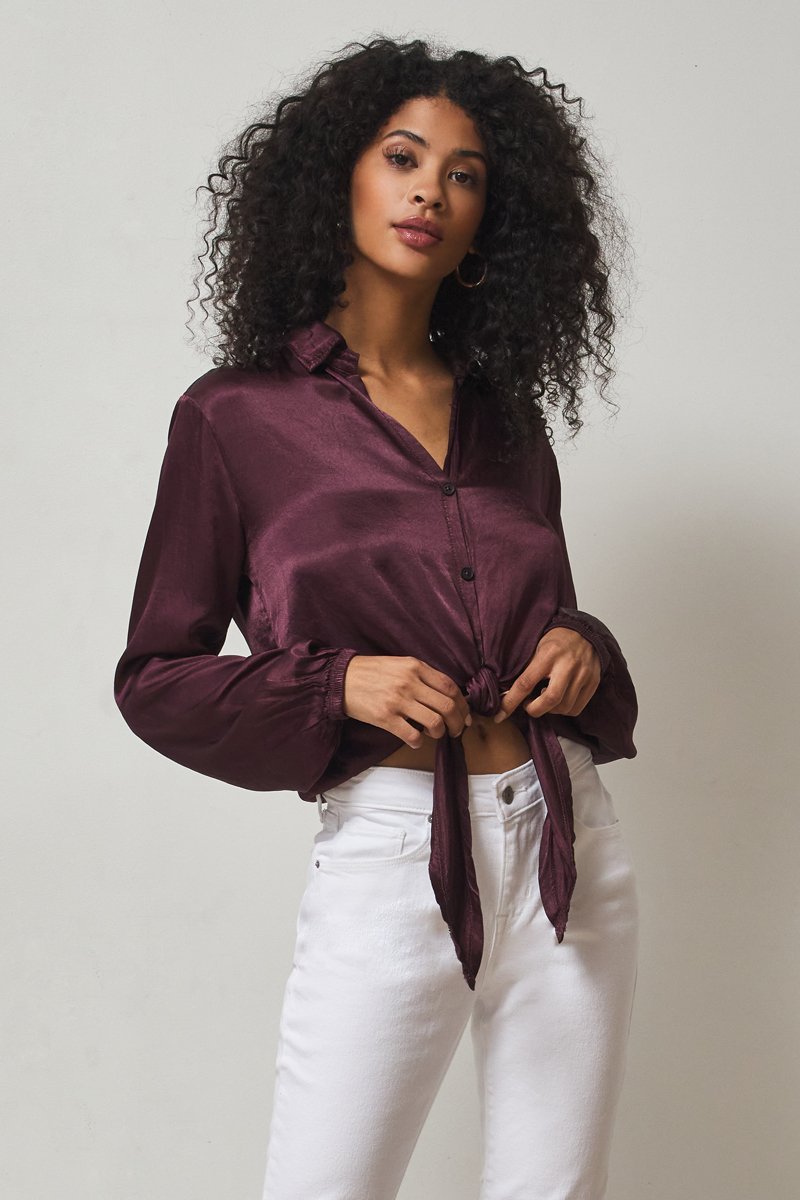 dark purple top in silky material with front tie and buttons