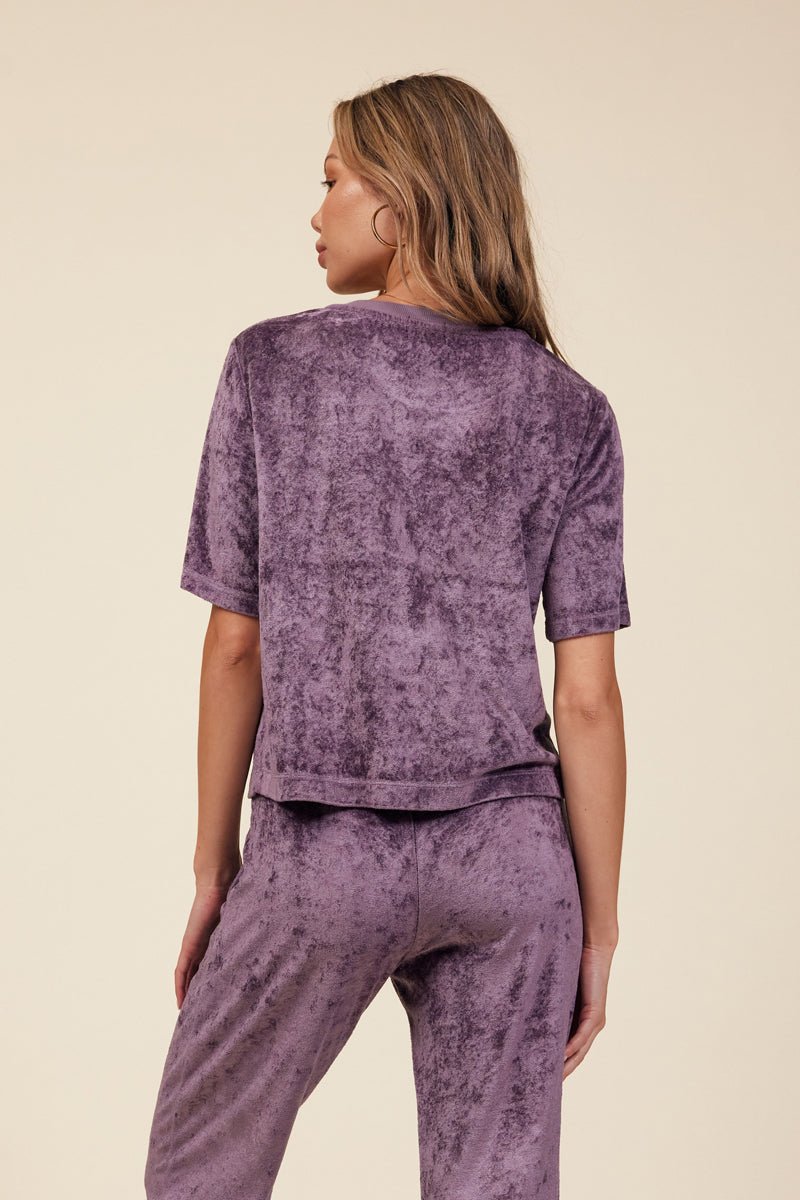 back of purple velvet tee with ribbed contrast neckline