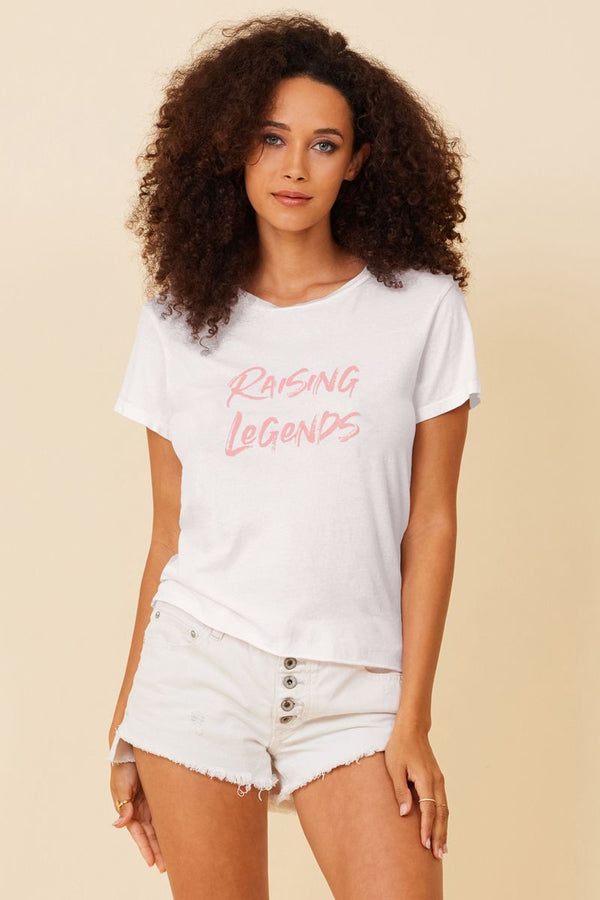proceeds to charity for this white tee with light pink raising legends text on the front